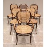 A matched set of six Thonet type bentwood chairs, early 20th century, each with a cordiform rattan
