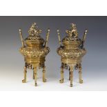 A pair of Chinese polished bronze koros and covers, 20th century, each compressed reservoir with