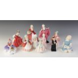 A collection of eleven Royal Doulton figurines, comprising: HN1772 'Delight', HN1537 'Janet', HN2107