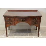 A 19th century mahogany serpentine side table, with a galleried back over the serpentine top and