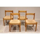 A set of four Vico Magistretti for Cassini 'Caramite' beech frame and rush-seated dining chairs,