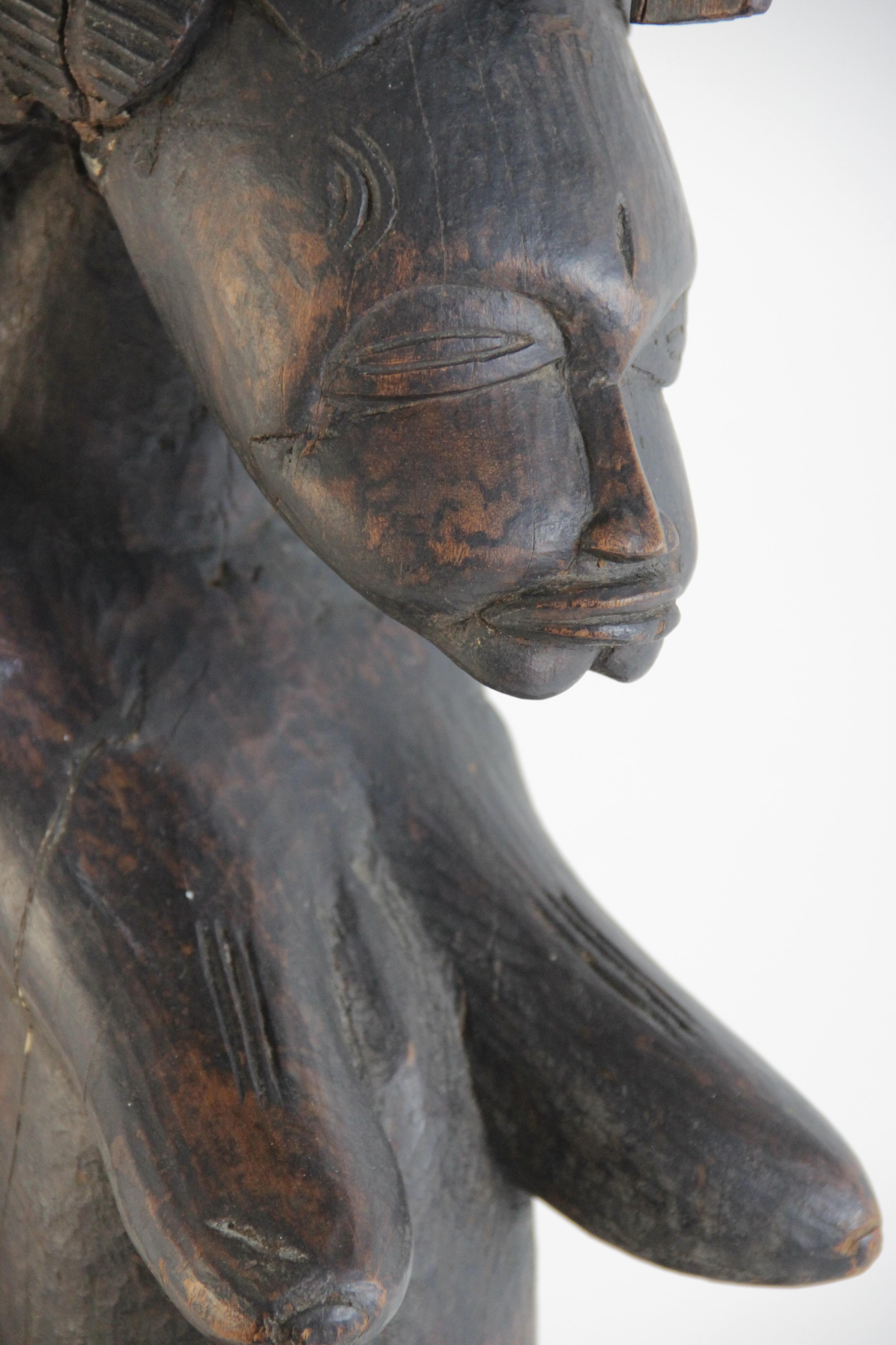 A Central African tribal fertility carving (possibly Congolese), modelled as a woman in tribal - Image 3 of 3