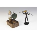 A Dutch illuminated pocket watch stand, early 20th century, modelled as a young girl in