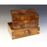 A mid 19th century burr walnut stationary box, applied with brass corner brackets and centred with a
