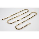 A 14ct gold rope twist chain, with lobster claw and loop fastening stamped '14K', 64.5cm long,