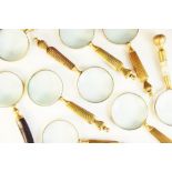 A collection of eleven magnifying glasses, 20th century, to include a horn handled example, two with
