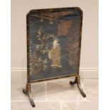 A 19th century Canton lacquered silk inset fire screen, the glazed rectangular frame with inverted