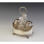 An Edwardian cut glass silver cruet set and stand, Thomas Bradbury & Sons, Sheffield 1908,