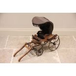 A Victorian wooden model of a horse drawn carriage, the canvas canopy enclosing a button back