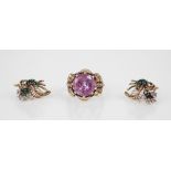 a 9ct gold synthetic pink sapphire ring, the central round mixed cut sapphire measuring 12mm