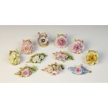 A set of six German porcelain florally encrusted place card holders by Schierholz & Sohn, 19th