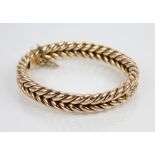 A Victorian 15ct gold woven-link bangle, tongue and box snap clasp fastening, 7.2cm x 6.3cm,