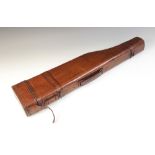 A French faux crocodile leather leg of mutton gun case, label to the underside end cover '