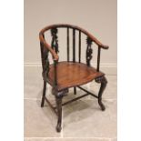 A Chinese carved hardwood altar chair, 19th century, the curved top rail on simulated bamboo