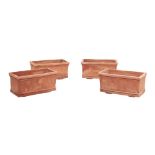 QUATTRO FIORIERE in terracotta di forma rettangolare. XX secolo - cm 54 x 30 Alt. cm 26