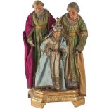 GRUPPO in terracotta policroma raffigurante "San Gioacchino, Sant'Anna e Maria con corona in metallo