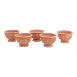 CINQUE FIORIERE in terracotta di forma circolare. XX secolo - Alt. cm 25 Ø cm 37,5