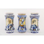 FORNACE DEL XX SECOLO Tre albarelli in maiolica policroma. - Alt. cm 26,5