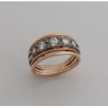 Ring aus Weiß- und Rotgold, 585/000, mit Diamanten. Ring mit einem doppelten Außenband und einem