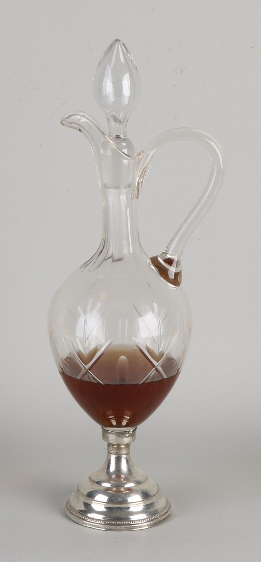 Decanter on a silver base
