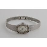 White gold watch with diamond