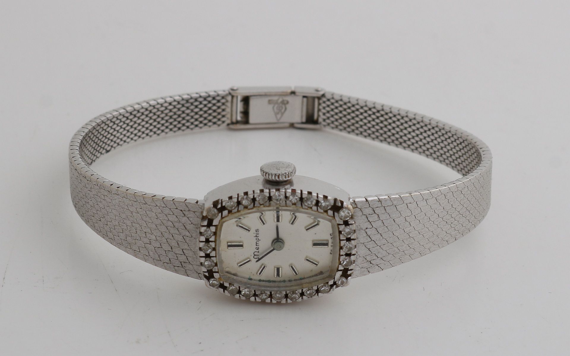 White gold watch with diamond