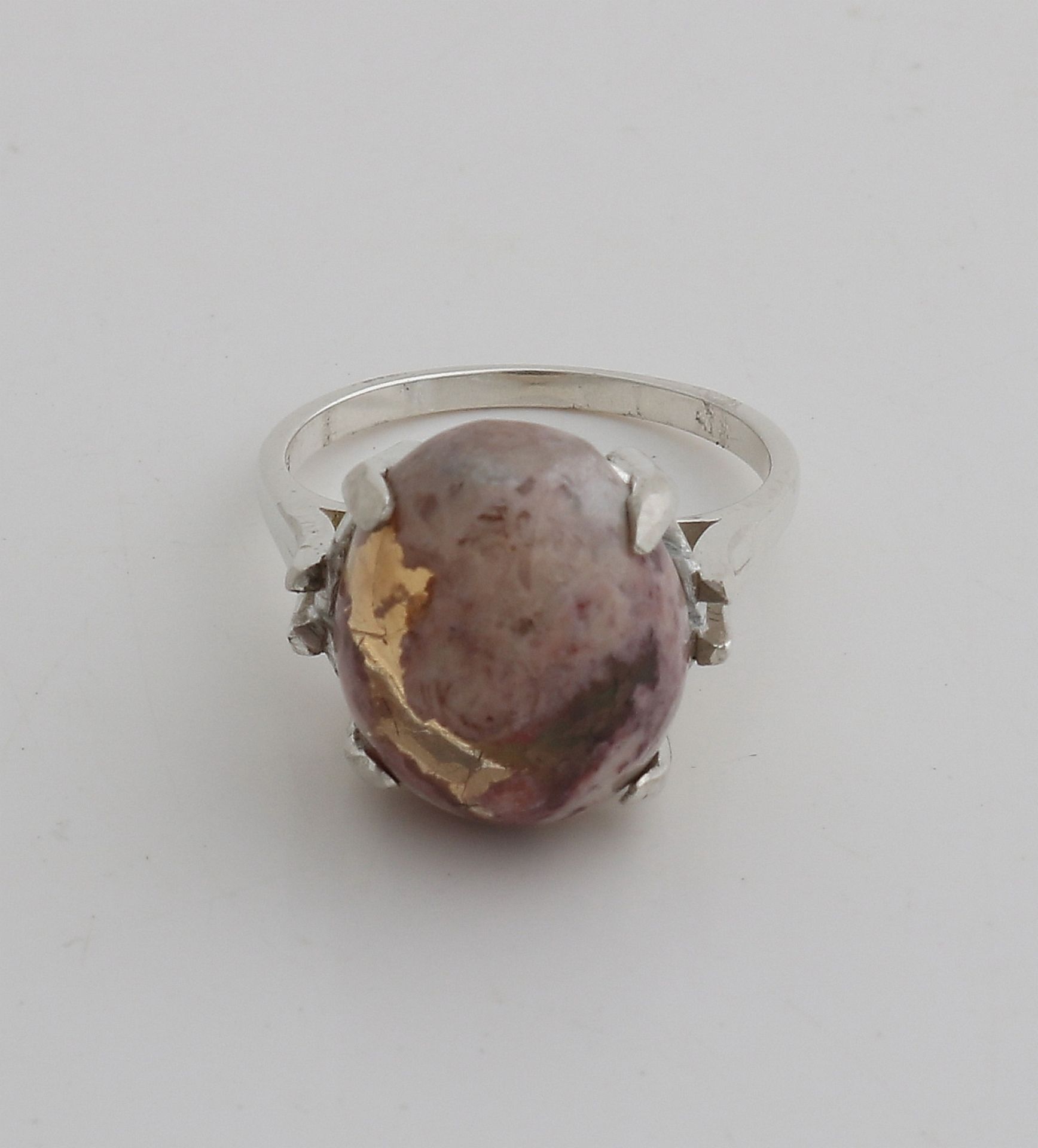 Silver ring with fossil opal