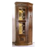 Corner cupboard with stained glass