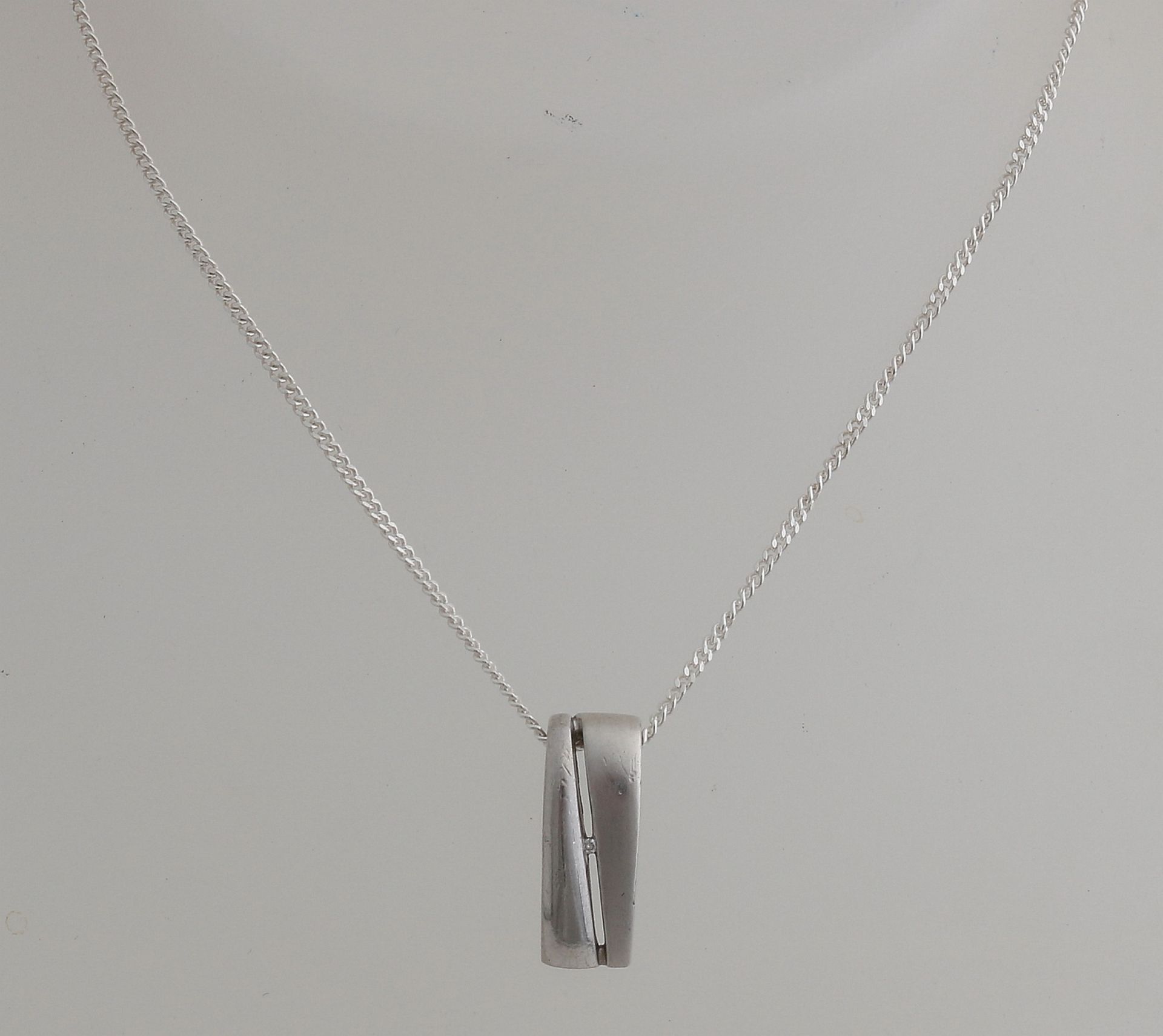 Silver necklace with diamond pendant