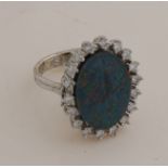 White gold ring with opal and diamond