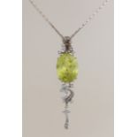 Silver necklace with pendant, green stone