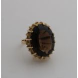 Gold ring with smoky quartz