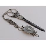 Scissors with silver, chain etc.