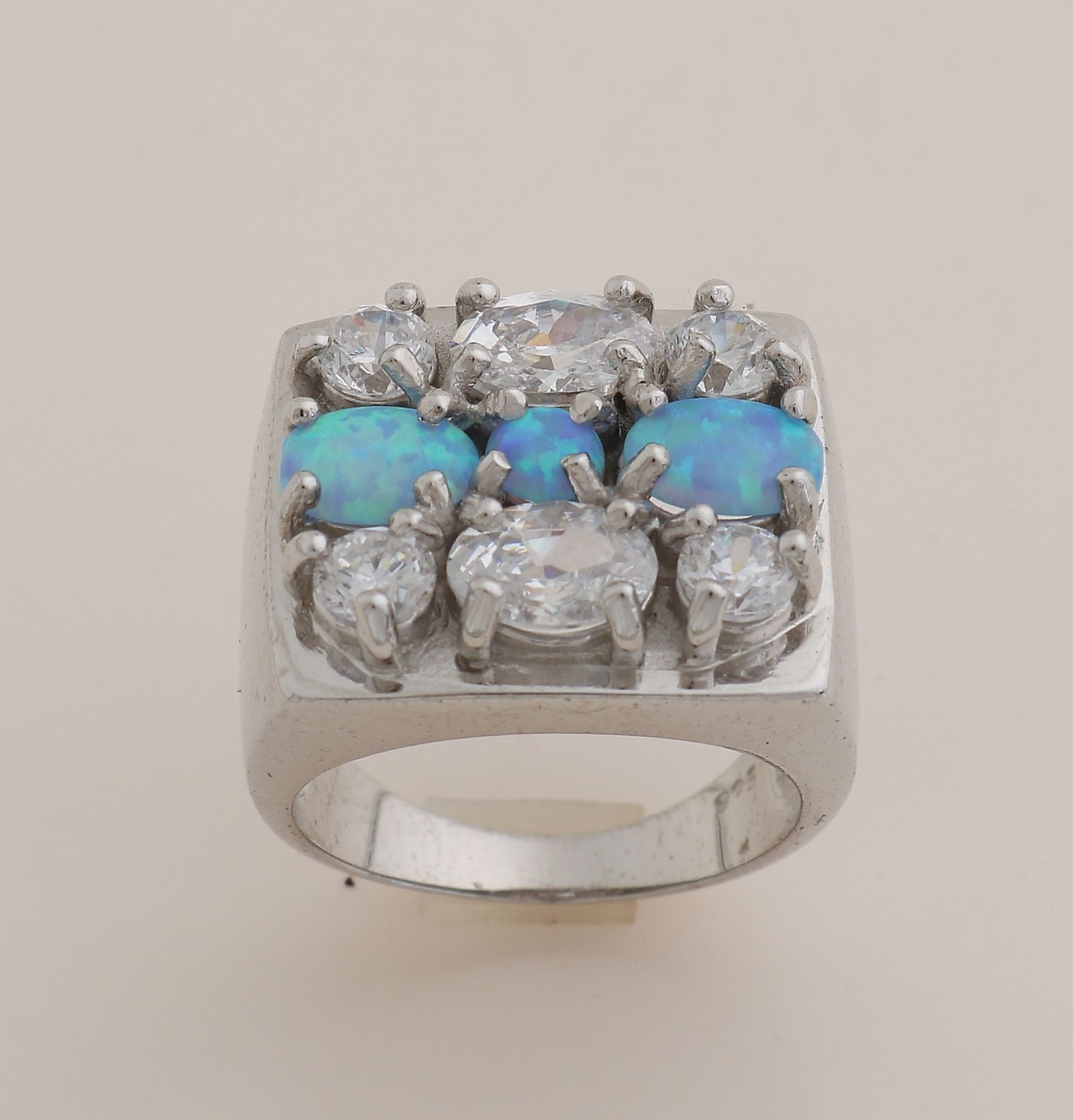 Silver ring with opal and zirconia's