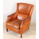 Old calf leather armchair
