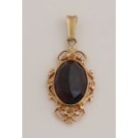 Gold garnet pendant