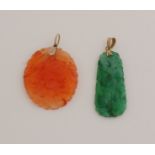 2 Jade pendants with gold