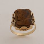 Gold ring with carved tiger eye