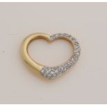 Gold heart shape pendant with diamond