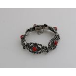 Silver bracelet with coral