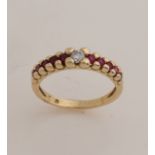 Gold ring with ruby ​​and cubic zirconia