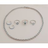 Set of silver jewelery with blue stone