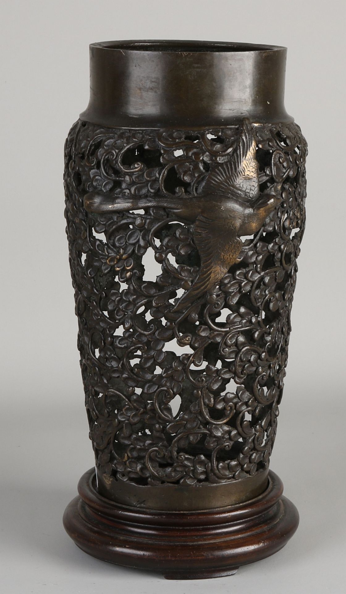Japanese bronze vase on a pedestal