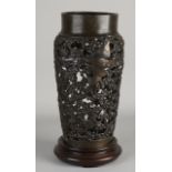 Japanese bronze vase on a pedestal