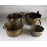 Four antique brass pans