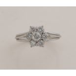 White gold entourage ring with diamond