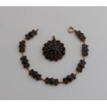 Bracelet and pendant with garnet