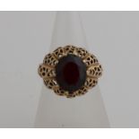 Gold ring with garnet