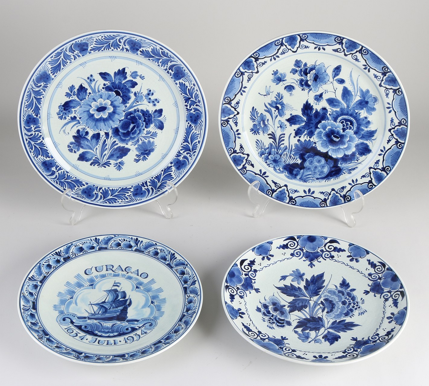Four Antique Delft Blue plates
