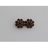 Gold garnet brooch